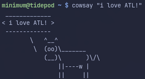 a terminal with the user as "minimum" and the hostname as "tidepod" doing the command `cowsay "i love ATL"` which outputs an ASCII art of a cow with a speech bubble that says: "i love ATL!"